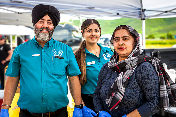 Owners of an Indian family restaurant at a food festival.