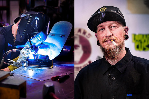Welder in custom motorcycle shop and garage.