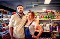 Cute couple who owns East European grocery store.