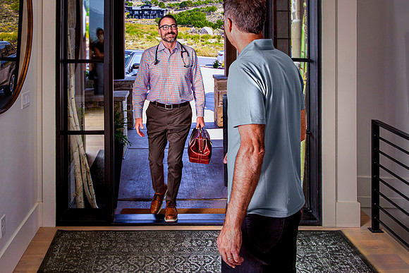 doctor-enters-patient-home-housecall.jpg